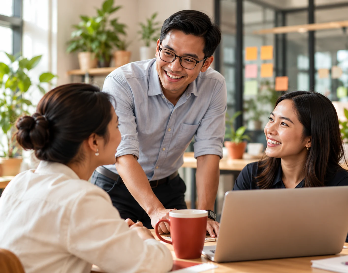 A business team working together in a warm, light-filled studio